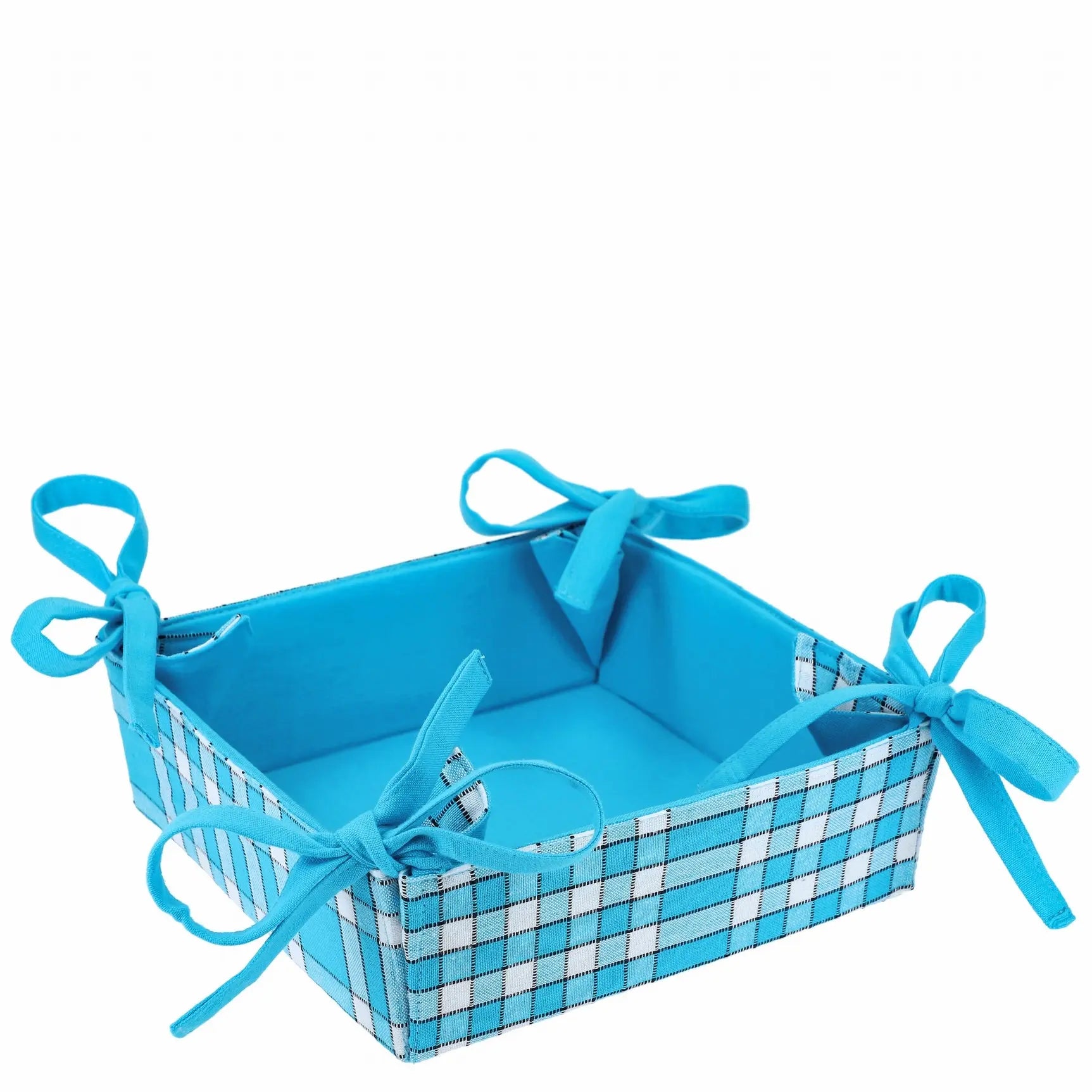 Corbeille à pain en tissu à carreaux bleus, élégante et réversible avec rubans, idéale pour présenter le pain et fruits.