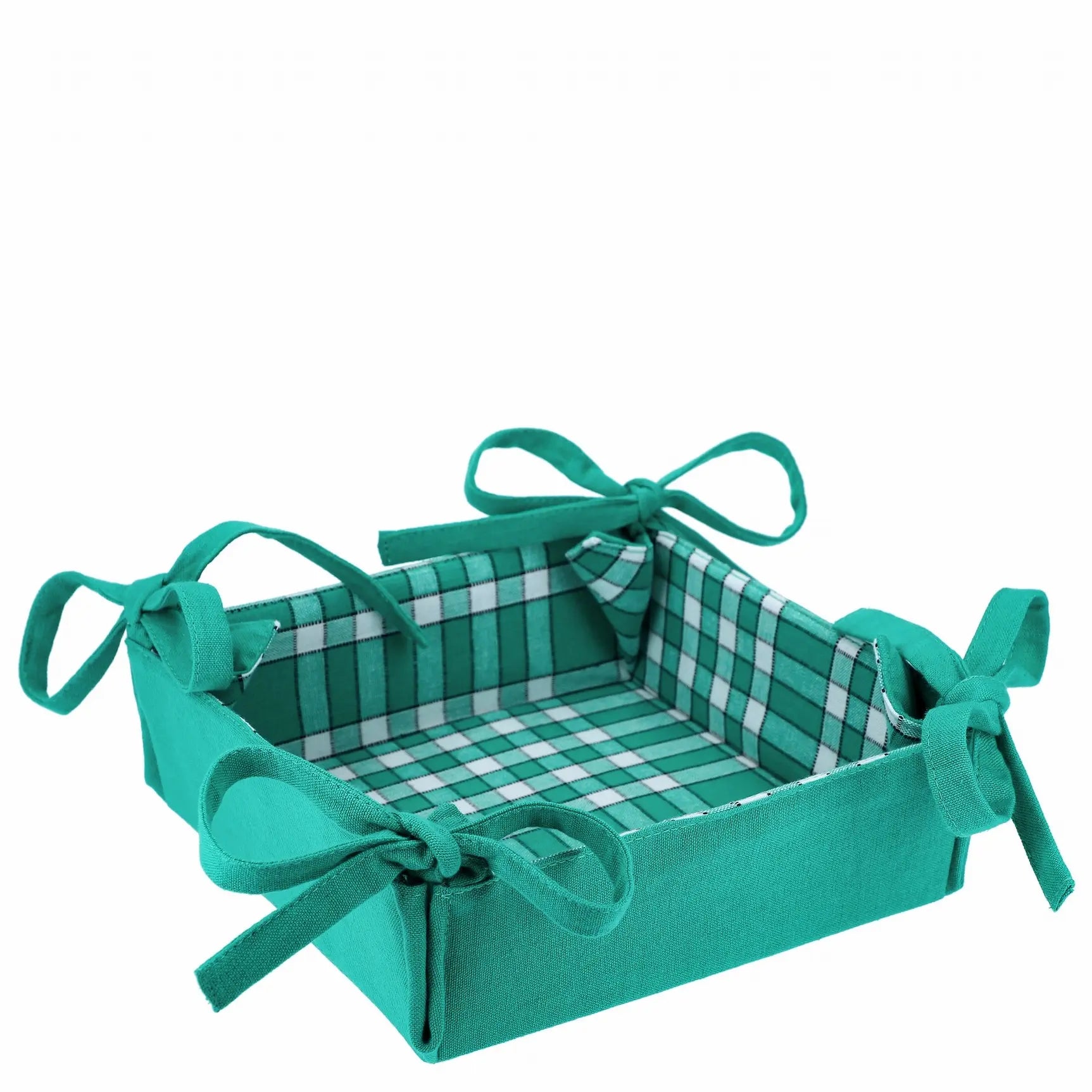 Corbeille à pain en tissu vert réversible à carreaux et uni, avec nœuds décoratifs, idéale pour pain ou fruits.