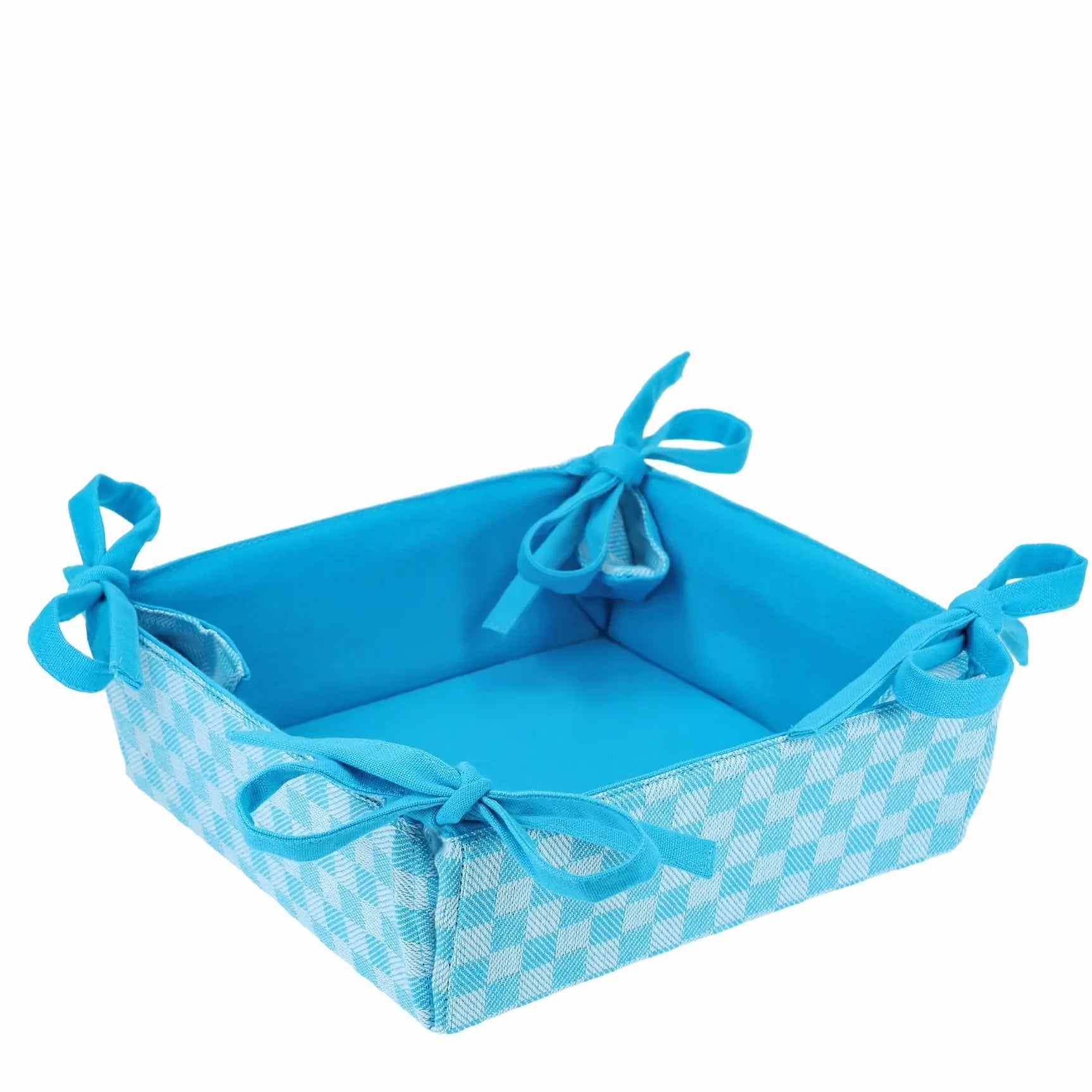 Corbeille réversible en tissu à damier bleu, idéale pour présenter pain et fruits, avec nœuds décoratifs aux coins.