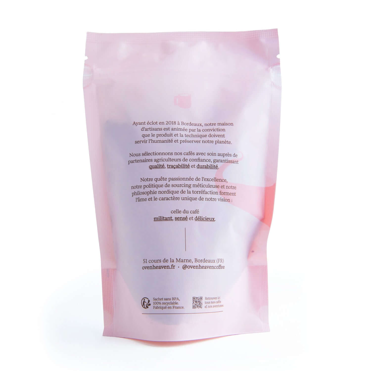 Emballage côté du café en grains Oven Heaven Il Dinosauro, espresso corsé, avec texte sur fond rose.