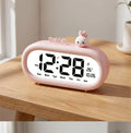 Réveil digital enfant rose avec figurine lapin à nœud rose