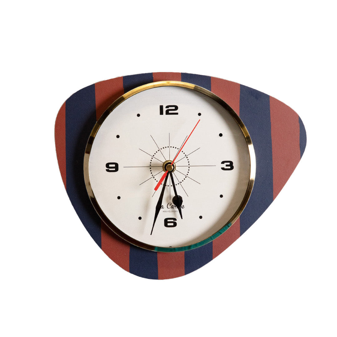 Horloge mediator motif rayures fond beige
