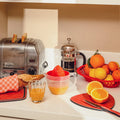 Corbeille Ovale Rétro Made in France rouge vintage contenant oranges, décoration maison vintage années 50-70, accessoire cuisine rétro.