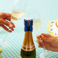 Le Bouchon à Champagne Conservation Effervescence en acier inoxydable et silicone, accessoire vintage rétro années 50-70.