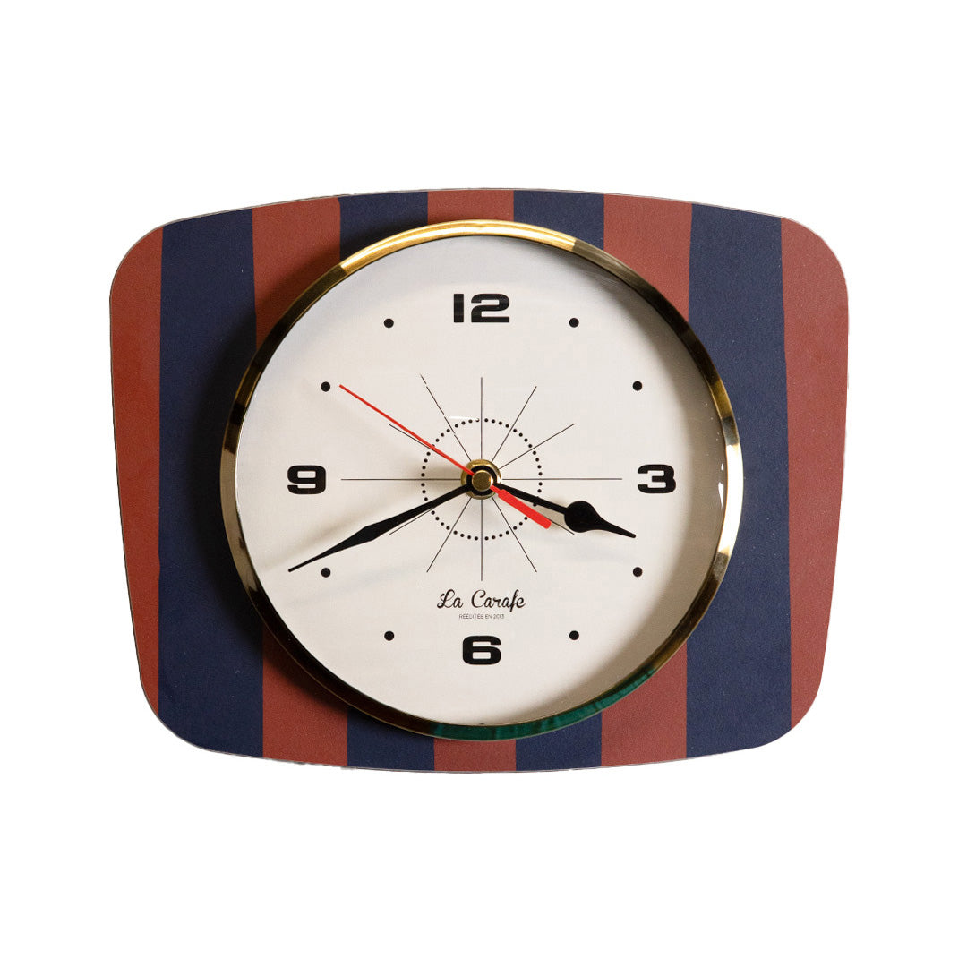 Horloge rectangulaire motif rayures bleu/rouge cadran beige