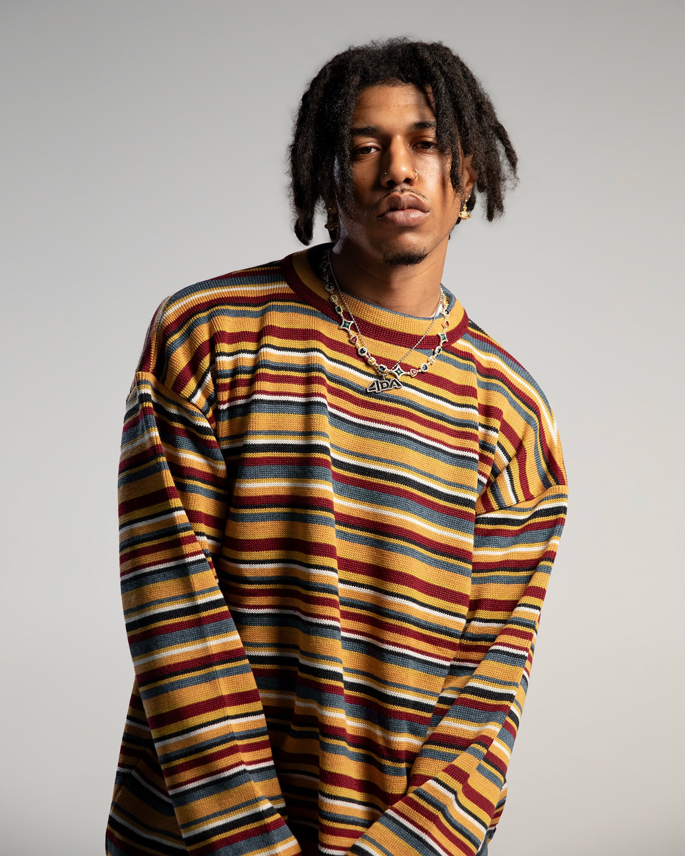 Pull rayé multicolore oversize DDP – détail de la maille et du col rond