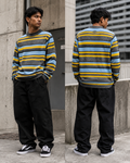 Pull DDP Multico 2 porté en ville avec pantalon large noir