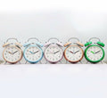 Réveils double cloches série pastel : champagne doré, bleu ciel, rose poudré, caramel et vert émeraude