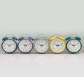 Réveils double cloches à cadran sobre : bleu pétrole, bleu ardoise, gris céladon, jaune et vert foncé